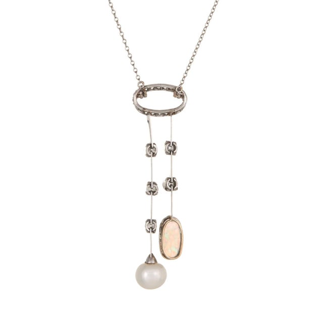 This is part of Chairish’s Fine Jewelry assortment. Finely detailed antique Edwardian era negligee drop necklace (circa...