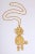 This is part of Chairish’s Costume Jewelry assortment. Large green eyed poodle pendant necklace. Poodle is 4.5" high x...