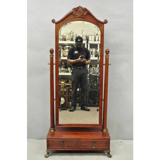 Vintage Bombay Company Cherry Wood Victorian Style Standing Cheval Mirror with Drawer. Circa Late 20th Century....