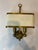 An elegant and exceptionally well-preserved, unused pair of Italian brass two-light wall sconces. Distinguished by their...