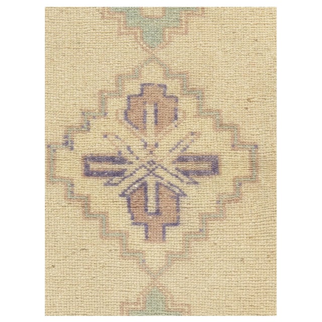 A vintage Turkish Yastik. Yastik's are small size rugs that are adaptions of traditional Turkish designs. Hand-woven in...