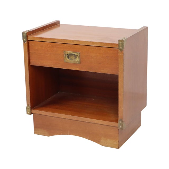 Vintage bedside table or small chest of drawers made of fiberboard and teak veneer with brass details; manufactured by...