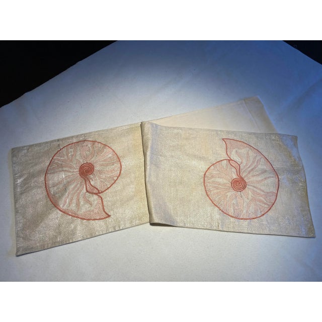 A Seashell embroidered motif on linen like fabric with subtle silver sheen. This table runner is perfect decorative accent...