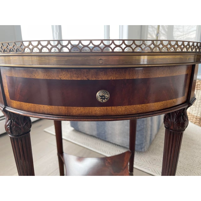 this is a gorgeous table by Scully and Scully of New York $2885 retail. There are some spots as shown on the top that...