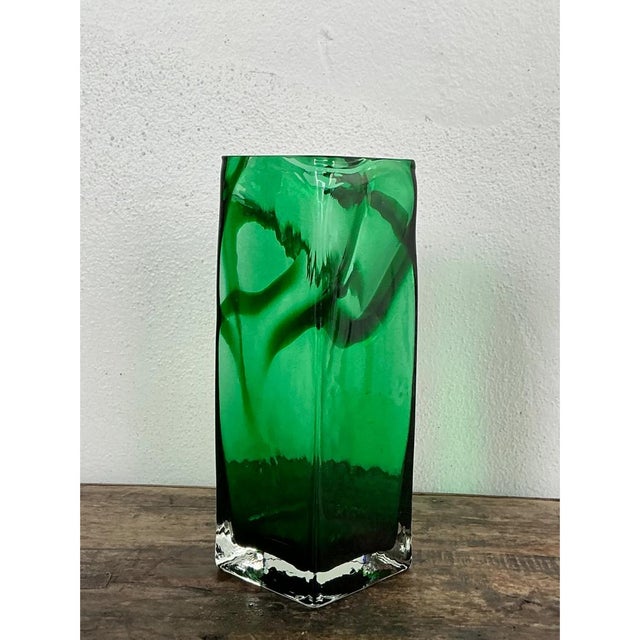This vintage Polish glass vase rises in a bold, tall rectangular form, its four faceted sides meeting in crisp vertical...