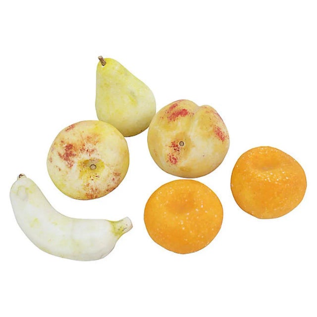 Set of six hand-carved Italian alabaster fruits. No maker's marks. Dimensions: smallest piece, 2.5"Dia x 2"H; largest, 5"L...