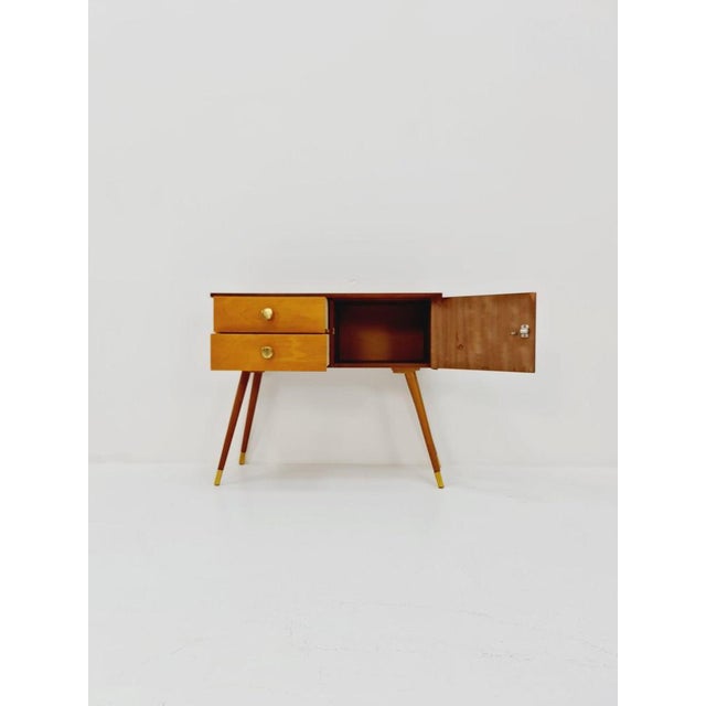 German mid-century teak and beech small sideboard / side table, 1950s Dimensions: : 32 D x 68 W x 57 H cm It is in good...