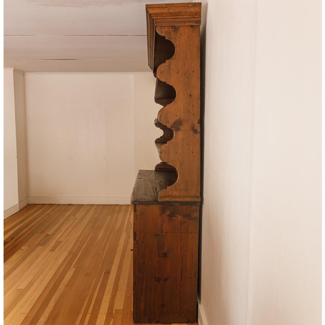 This magnificent Early American style step-back hutch is a spectacular showcase of traditional, unsigned American...