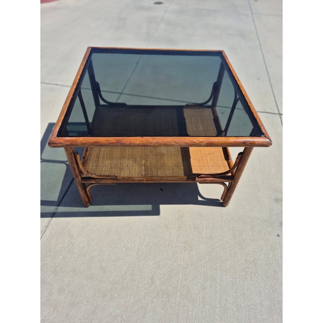 This vintage 1970s style mid-century modern coffee table features an organic, boilerplate bohemian design built from thick...