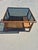 This vintage 1970s style mid-century modern coffee table features an organic, boilerplate bohemian design built from thick...