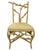 Sculptural architectural side chair crafted in a faux bois, branch-form design with hand-wrapped rattan construction. The...