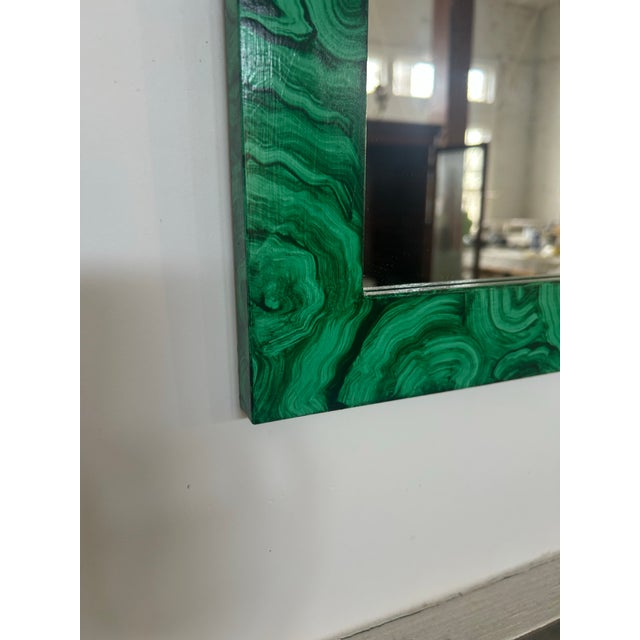 Malachite mirror hand painted by E. Lee Jahncke Mead custom made at her studio in New Orleans. The decorative painting is...