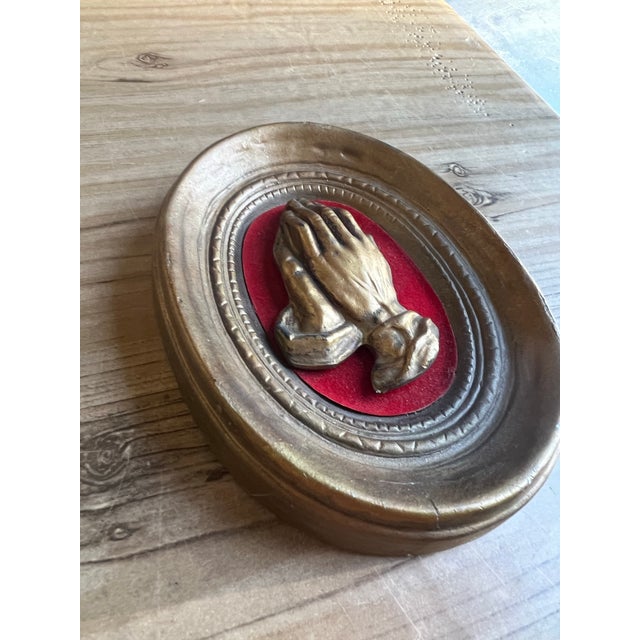 Up for consideration is a beautiful vintage small red and gold praying hands decorative wall hanging. This would look...