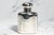 An elegant example of late Victorian luxury, this antique sterling silver scent bottle was crafted by the celebrated...