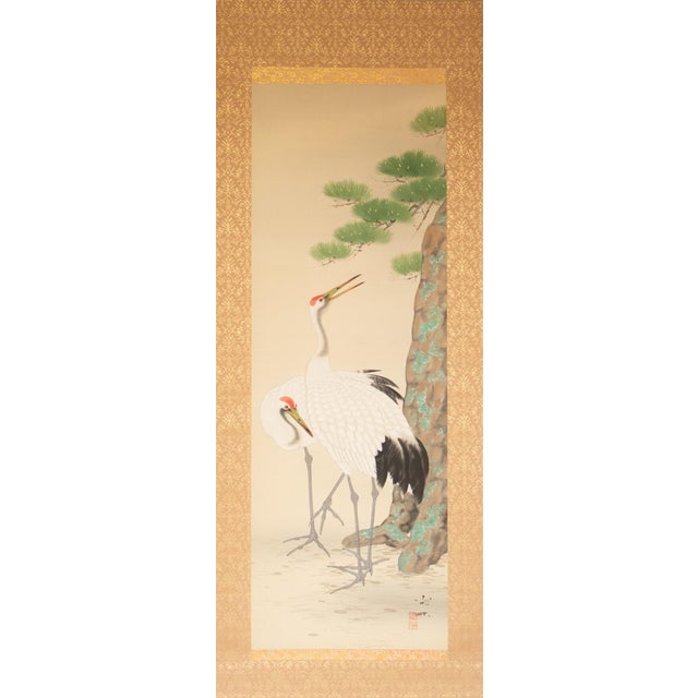 Magnificent large vintage Japanese silk scroll painting depicting Two Red-Crowned Cranes and a Big Old Pine Tree. Signed...