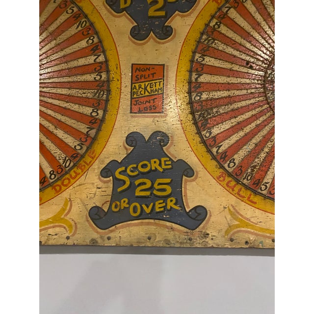 A rare monumental fairground double target game board inscribed “ 3 Darts for 2d and Score 25 or Over”. Hand painted wood...
