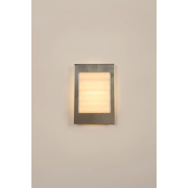 Introducting Frame, a collection of handcrafted wall sconces. Featuring a minimalist design, simple forms, and the subtle...
