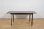 This extending dining table was manufactured by the Scottish furniture maker A.H. McIntosh & Co. during the 1960s. The...