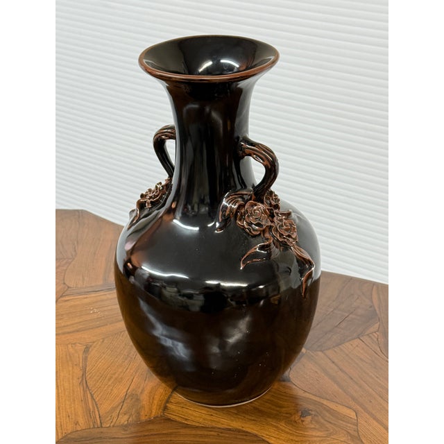Design Plus Gallery presents an Antique Replica Ceramic Vase. The rounded body rises to a narrow neck and flared opening,...