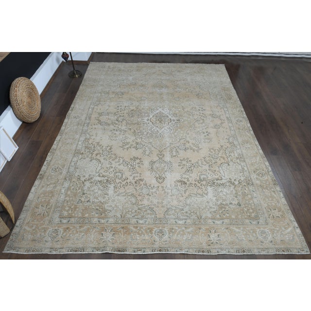 Vintage Persian Hand-Knotted area rug is a semi-antique vintage area rug. The '70s Eastern region of Anatolian's unique...