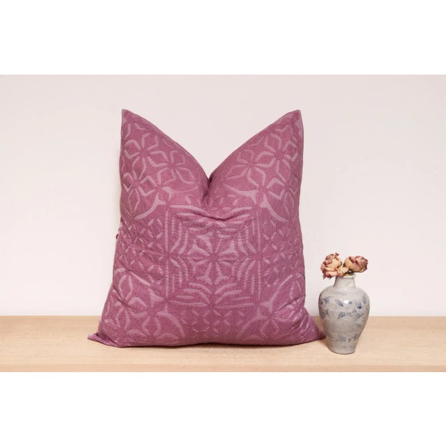 This vibrant decorative pillow cover features beautiful array of patterns, with hand crafted appliqué cut work, giving it...