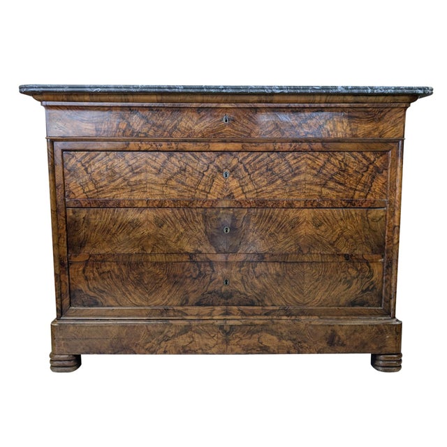 Exceptional mid-19th century French Louis Philippe commode crafted in richly figured burl walnut with dramatic book-...