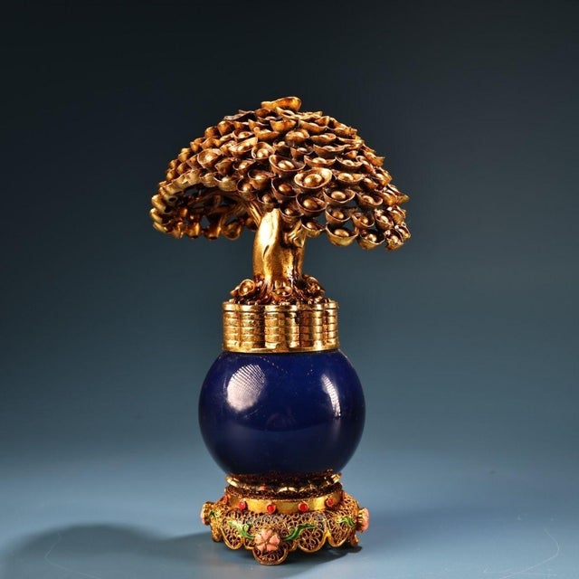 This is a striking and ornate "Money Tree" (also known as a wishing tree or treasure tree) sculpture, crafted from heavily...