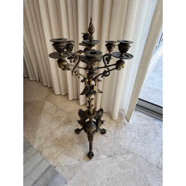 Elevate your space with this stunning turn-of-the-century bronze candelabra, a timeless piece that effortlessly blends...