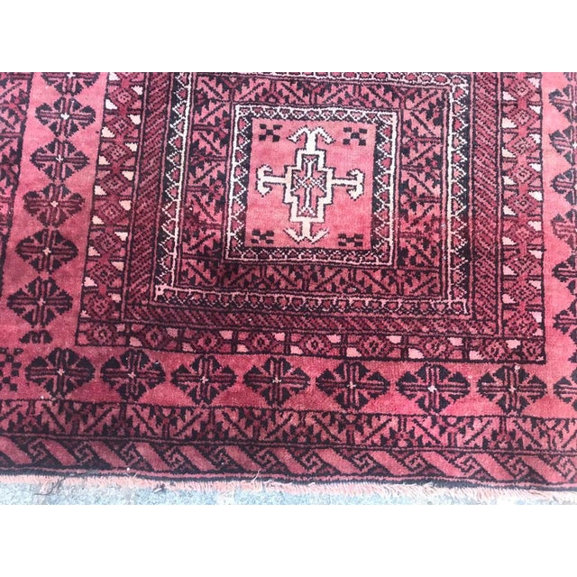 Beautiful late 20th century Baluch Afghan rug with tribal geometric design and brown field color and pink, entirely hand...