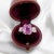 Magnificent trilogy ring in 18 carat gold (750 thousandths). It is adorned with a pink sapphire of Ceylon origin of...