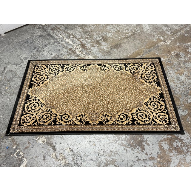 Design Plus Gallery presents a 3ft 3in × 5ft 2in Jungle Book Area Rug. The machine-made area rug showcases a leopard-...