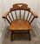 Vintage mid-century captain's arm chair from the Tell City Chair Company crafted out of solid hard maple wood. Features a...