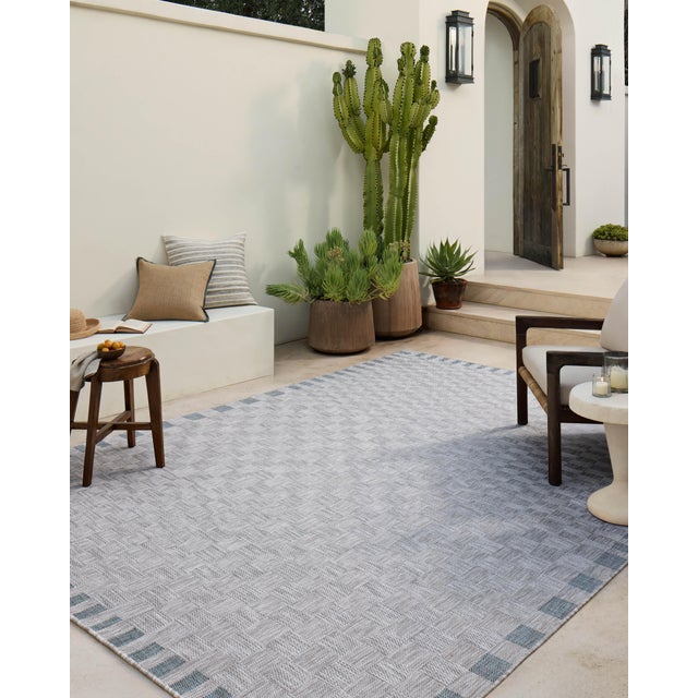 Inspired by the scenic mountain town in California, the Topanga Collection is an indoor/outdoor rug made of durable...
