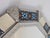 A uniquiley shaped Hojalata (punched tin) with hand painted Talvera Tiles Mirror. It's signed by the artist, which is rare...