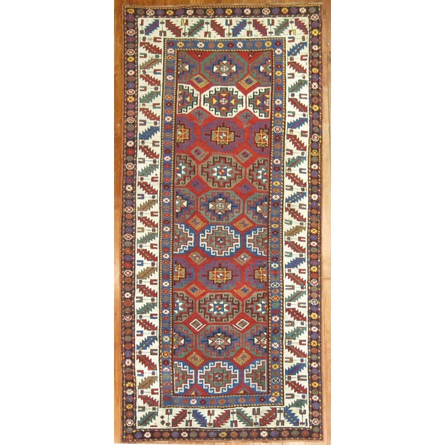 An early 20th century Kazak Moghan small Runner Details rug no. 8986 size 3' 6" x 7' 7" (107 x 231 cm)