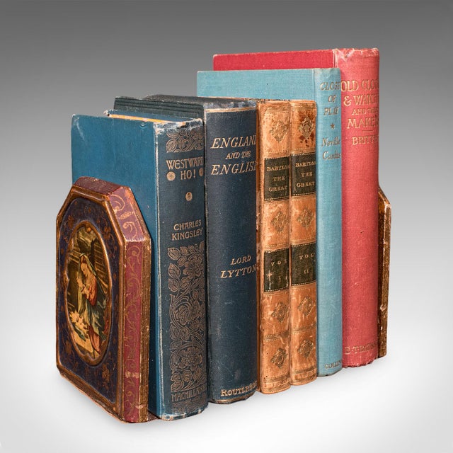 This is a pair of small vintage Renaissance revival bookends. An Italian, giltwood decorative book rest, dating to the mid...