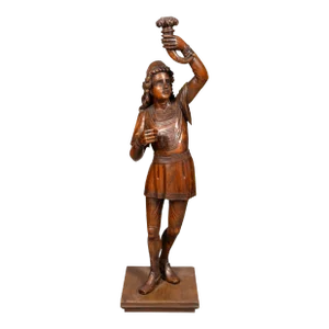 Italian Carved Walnut Torchere Of A Standing Boy Holding A Torch