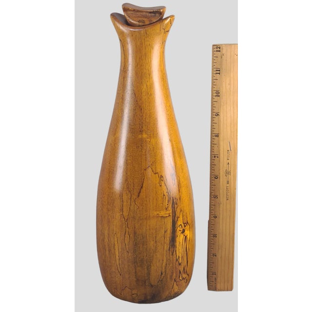 Great looking Mid-Century modern Olive wood decanter with a glass insert, measuring 14'' High 5'' Wide, good condition...