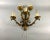 Wonderful an old five-light metal wall sconce with gold acanthus leaves and scrolles in a beautiful original shape. The...