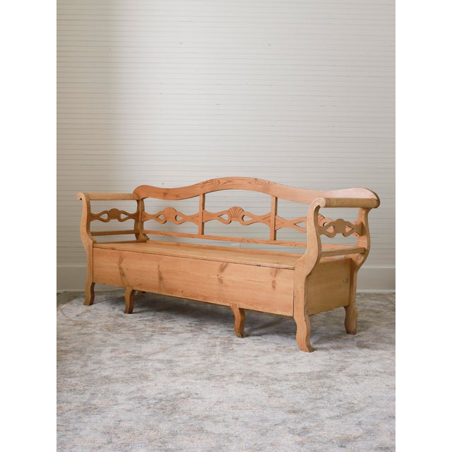 This lovely piece is an early to mid 19th century Swedish Farmhouse bench. Crafted from pine, it features elegantly...