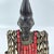 This figure is adorned in a cowrie shell vest, which is removable, and on a custom base. Ibeji figures, carved by the...