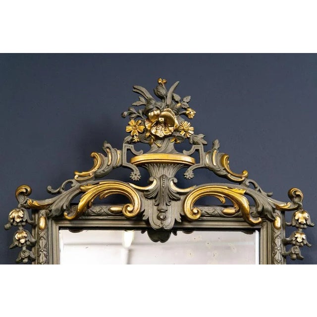 Object: Wall mirror Epoch & style: Historicism - end of the 19th century : - openworked and ornamented wooden frame with...