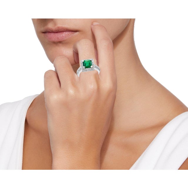 A classic, Cocktail ring 2.8 Carat Colombian Emerald and Diamond Ring, Estate, no color enhancement. Gold: 14 carat white...