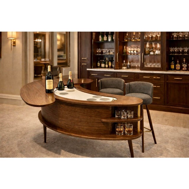 A true showstopper from the Atomic Age, this rare Grand Server articulating bar cabinet is a stunning example of Mid...