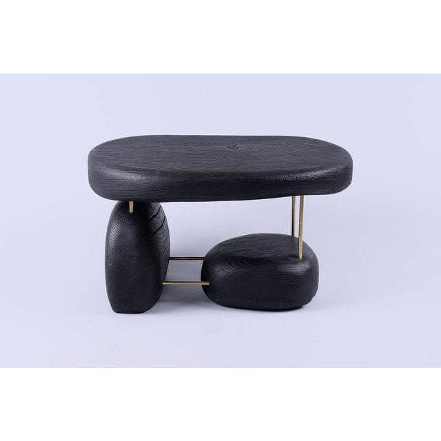 Unique wooden multifunctional piece usable as a side table, stool, or simply as a decorative object. It is build in...