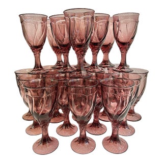 Late 20th Century Noritake “Sweet Swirl” Cranberry Glassware - A Set of 24 For Sale