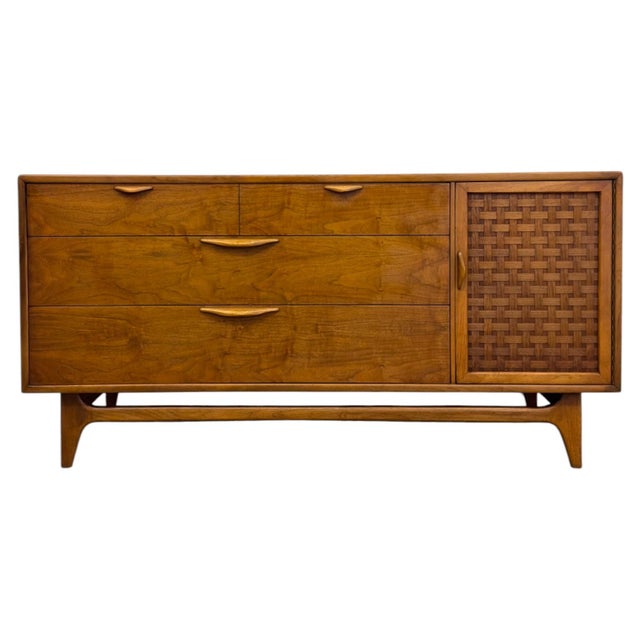 This authentic Mid-Century Modern lowboy dresser credenza from the iconic "Perception" collection designed by Warren...
