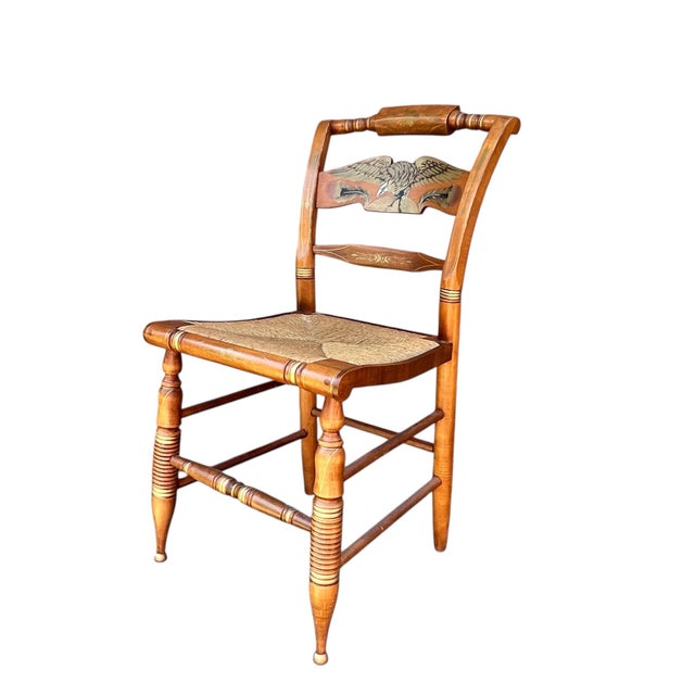 Vintage Ethan Allen Hitchcock eagle back, rush seat chair. Gold embellishments of an eagle, arrows and leaves. Marked...