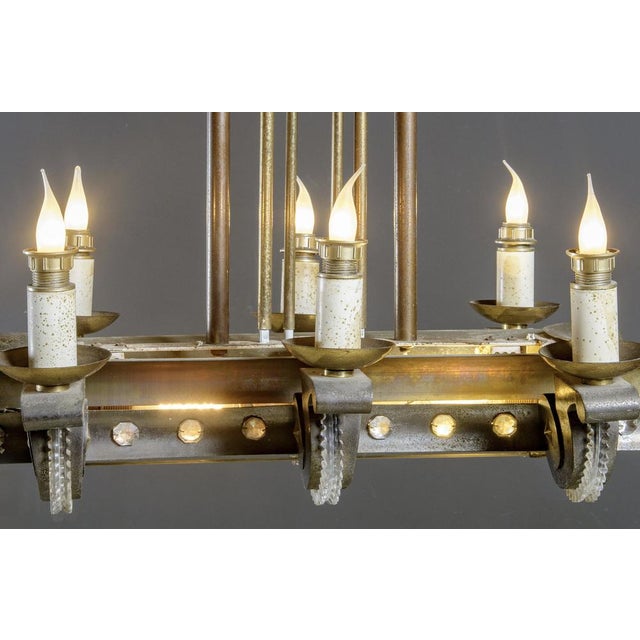 Art Decò Bronze French Chandelier, 1930s, in Good conditions. Designed 1920 to 1949 Up to 250V (Europe/UK Standard).The...