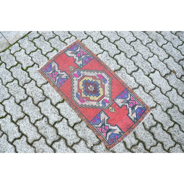 This is a vintage Turkish Oushak rug from the 1960s. The piece was hand-knotted.